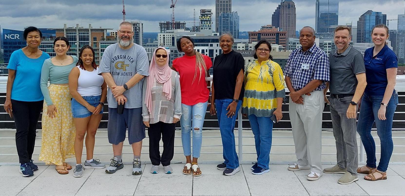 Members of the first cohort of the Faculty Training Program pose for photo during a return to Georgia Tech 2023